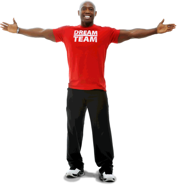 Paul Anthony, Calgary personal trainer and founder of Dreambody, standing with arms open wearing a Dream Team t-shirt